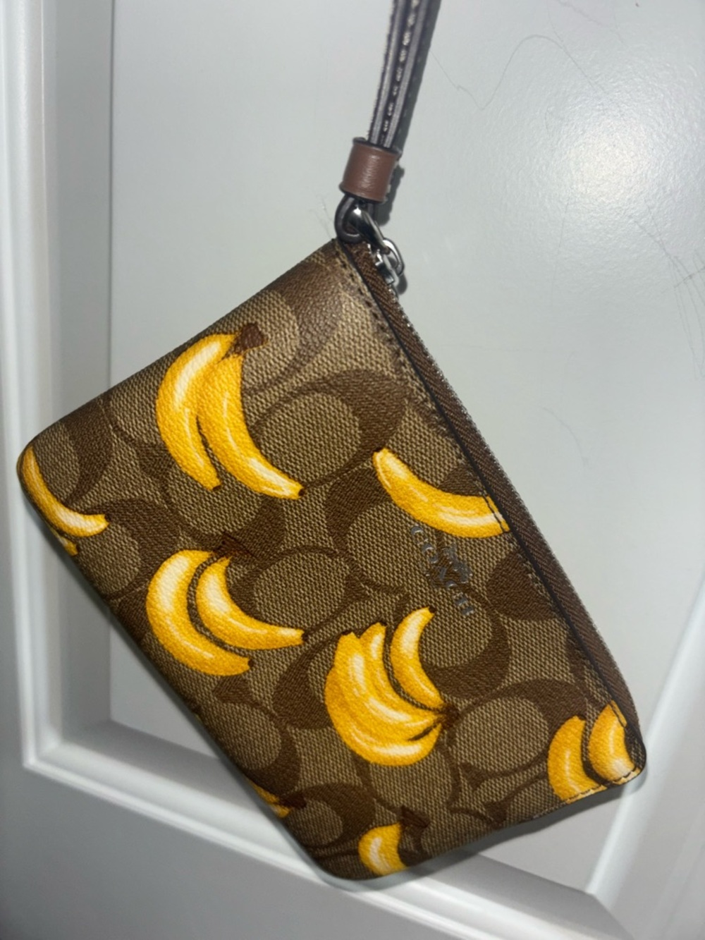 Coach Brown Signature Banana Print Corner Zip Wristlet